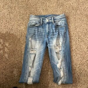 Mid rise ripped skinny jeans